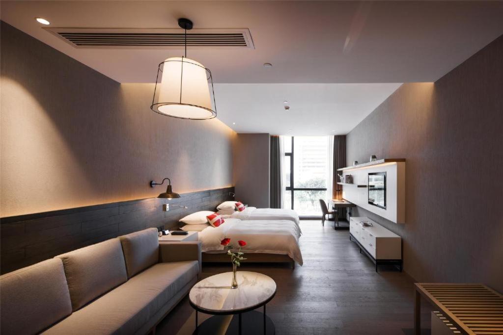 Swisstouches Guangzhou Hotel Residences Bagian luar foto